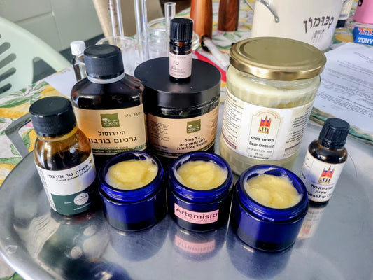 Collection of various jars and bottles on a reflective surface