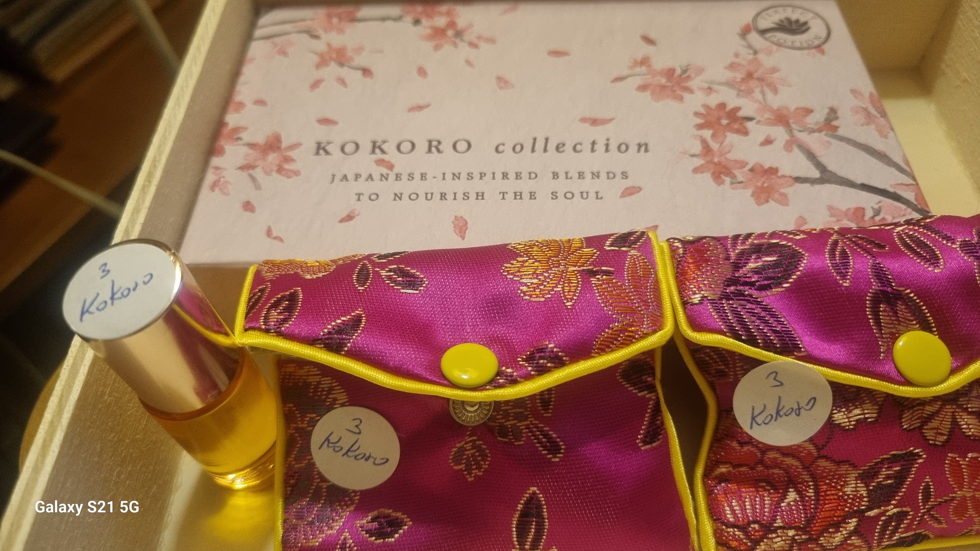 Kokoro collection product with a pink floral box in the background