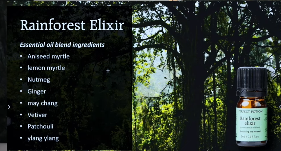 Rainforest Elixir essential oil blend with ingredients listed on a dark background